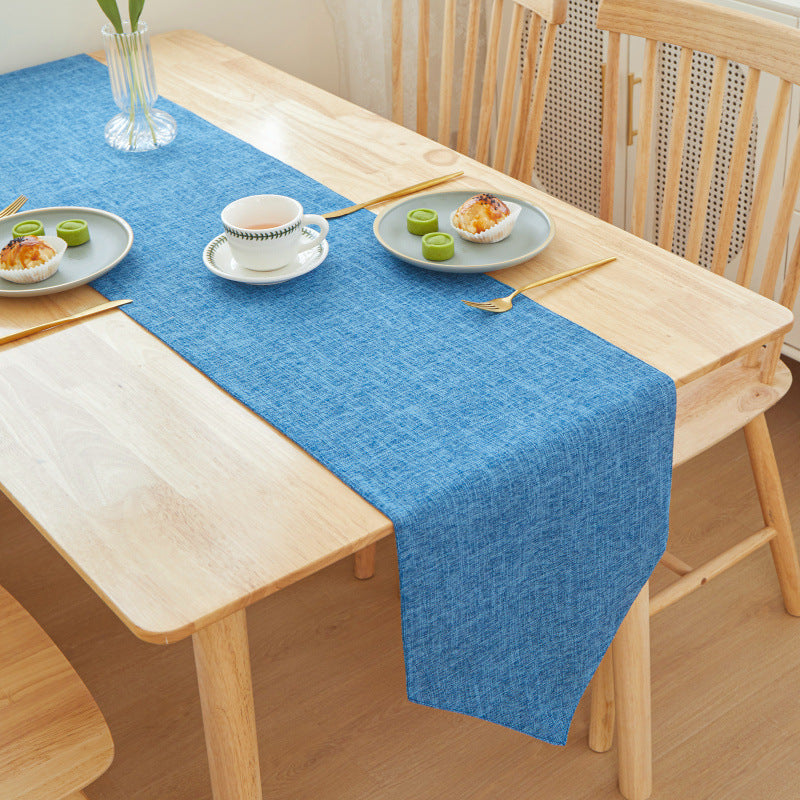 Textured Linen Table Runner, blue woven fabric with subtle crosshatch pattern and soft drape