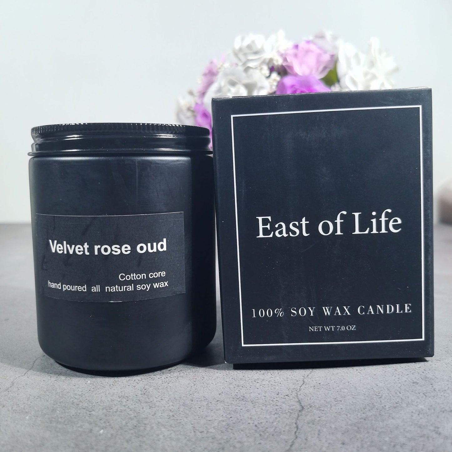 Velvet Rose Oud Soy Wax Candle, minimalist black jar with cotton wick and rich floral woody fragrance for a clean, long-lasting home ambiance