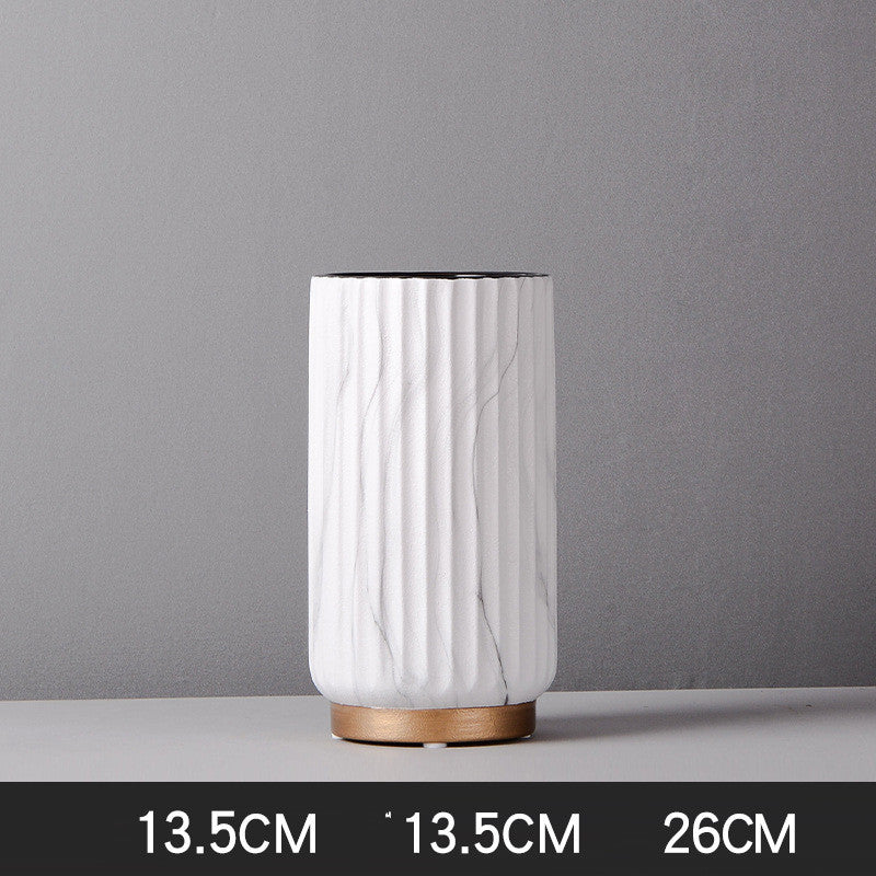 Medium Fluted Marble Vase, white marble with vertical ribbed texture and cylindrical form on wood base