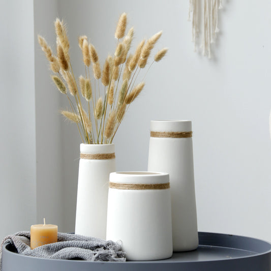 Minimal Rope Accent Vase Set, matte white ceramic cylinders with natural jute band detail and tapered forms