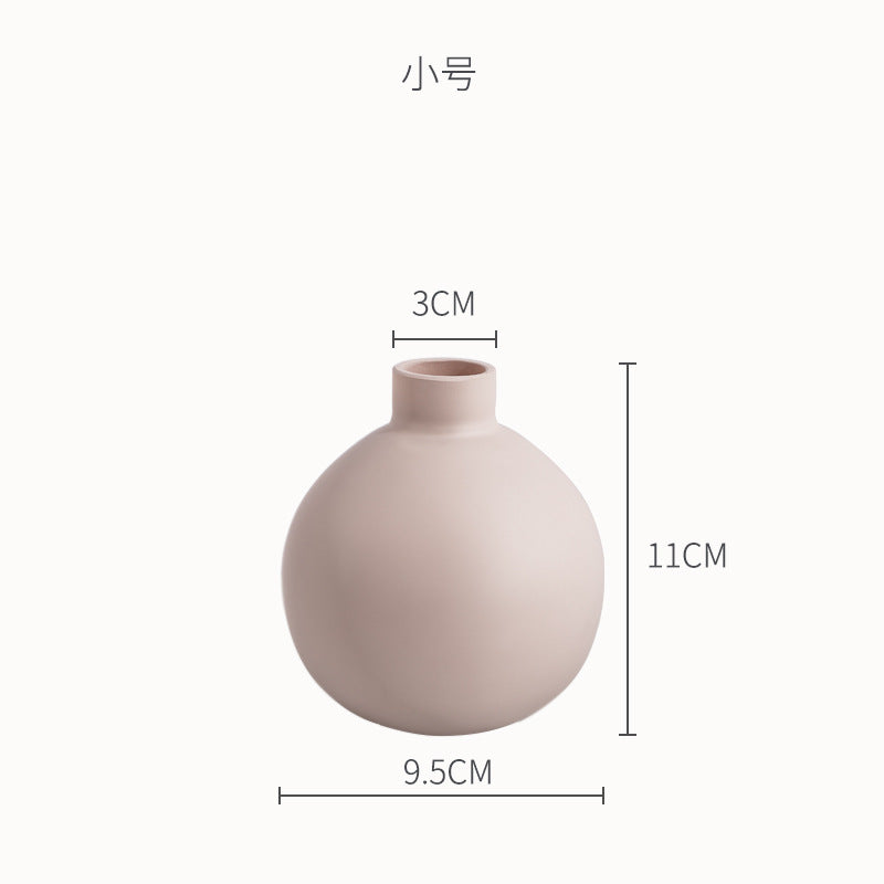 Minimal Round Vase, matte blush ceramic with spherical body and short neck