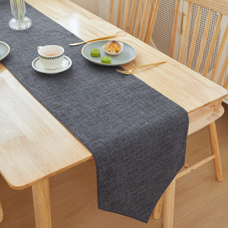 Textured Linen Table Runner, charcoal gray woven fabric with subtle crosshatch pattern and soft drape