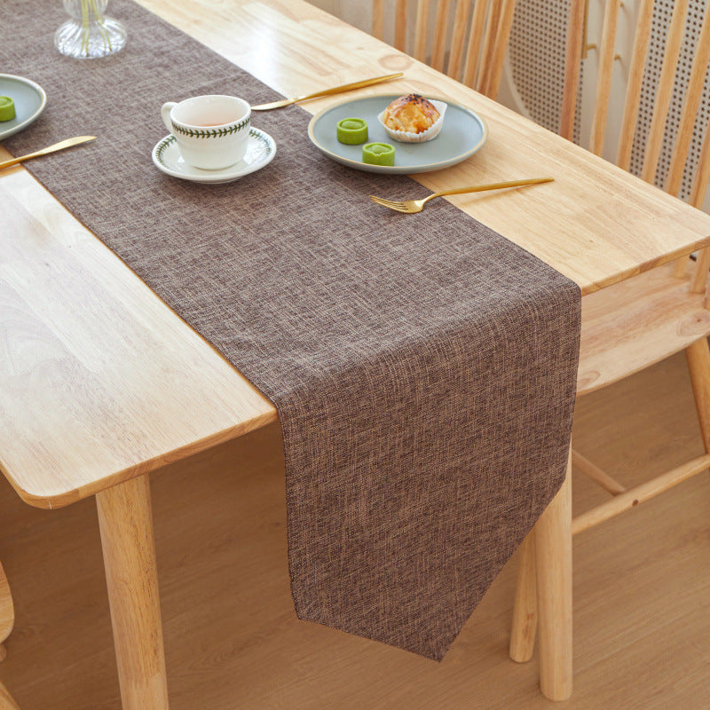 Textured Linen Table Runner, brown woven fabric with subtle crosshatch pattern and soft drape