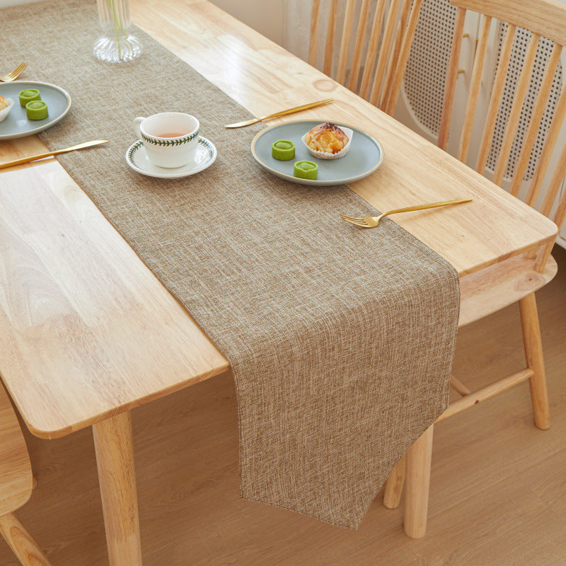 Textured Linen Table Runner, light brown woven fabric with subtle crosshatch pattern and soft drape