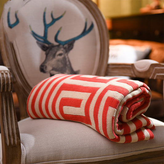 Geometric Knit Throw Blanket, red and cream pattern with bold maze design and soft textured weave