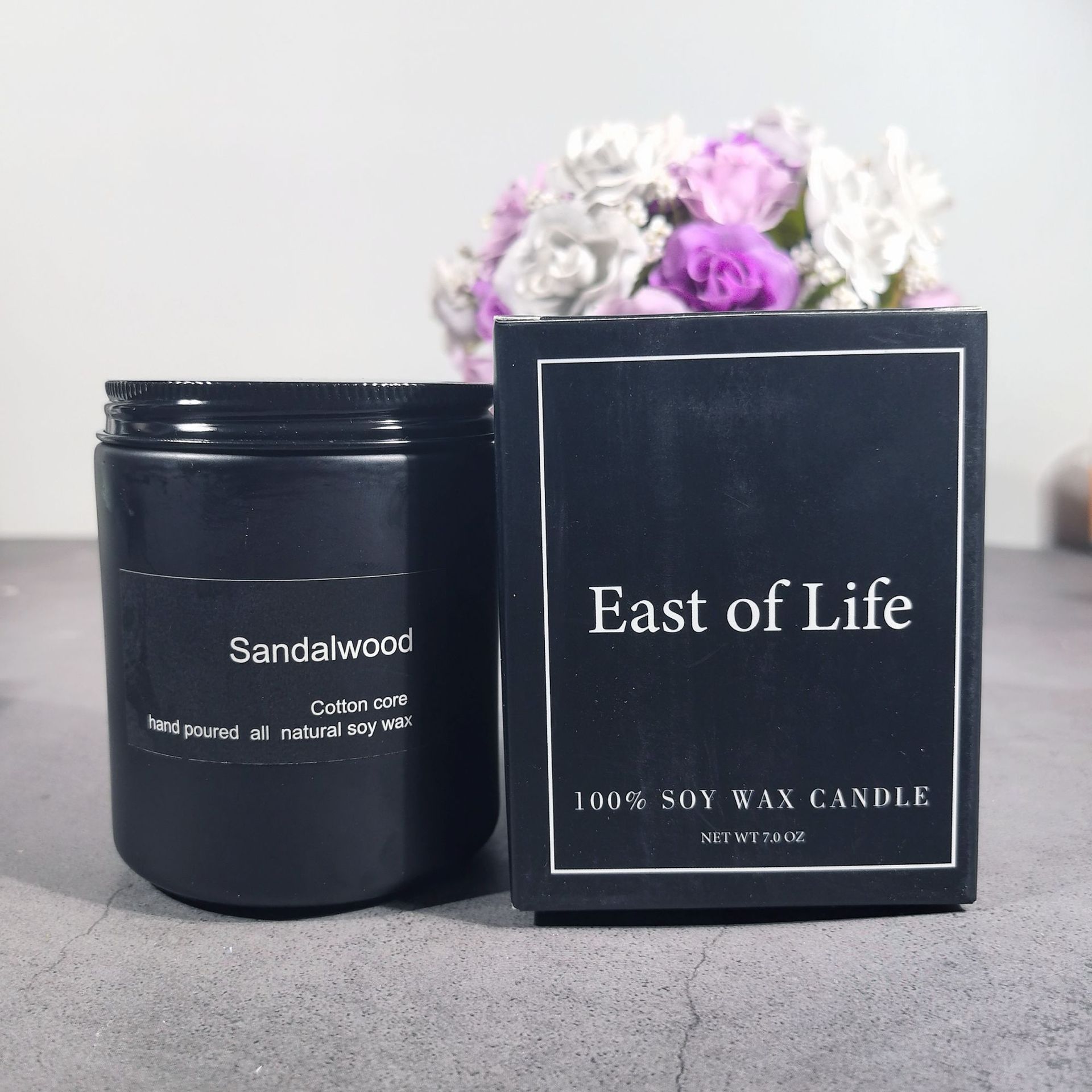 Sandalwood Soy Wax Candle, minimalist black jar with cotton wick and warm woody fragrance for a clean, long-lasting home ambiance