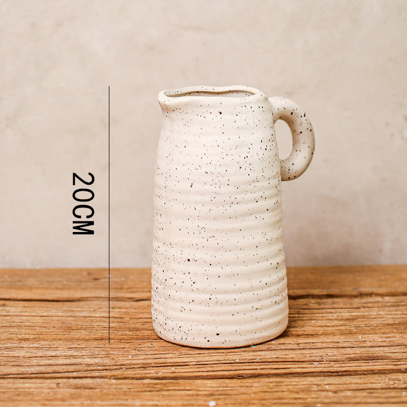 Speckled Pitcher Vase, textured off-white stoneware with ribbed surface and curved handle
