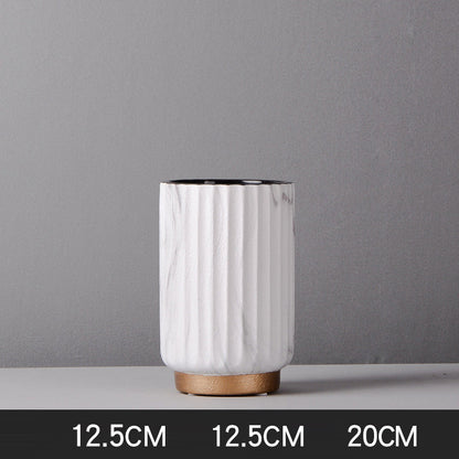 Small Fluted Marble Vase, white marble with vertical ribbed texture and cylindrical form on wood base