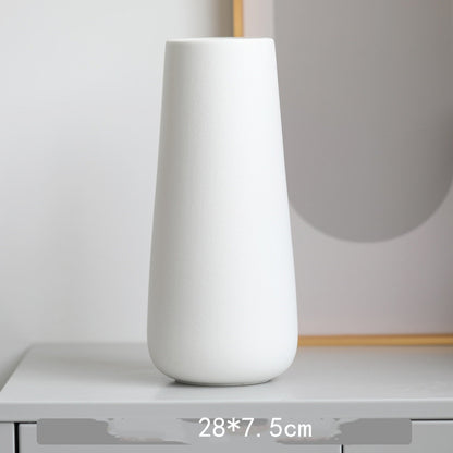 Minimal Tapered Vase, matte white ceramic with smooth elongated silhouette