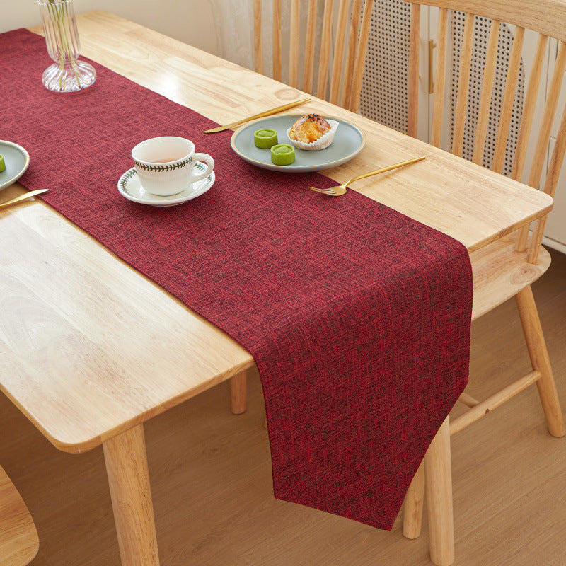 Textured Linen Table Runner, deep red woven fabric with subtle crosshatch pattern and soft drape