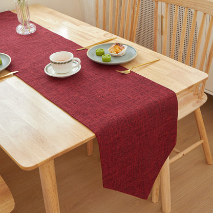 Textured Linen Table Runner, deep red woven fabric with subtle crosshatch pattern and soft drape