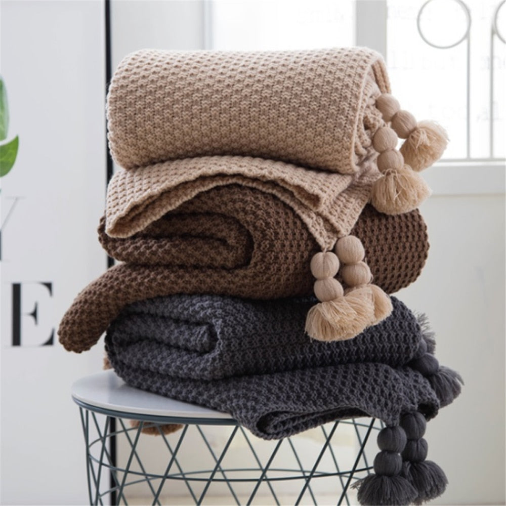 Textured Knit Throw Blanket with Tassels, soft waffle weave design in neutral tones for cozy home decor