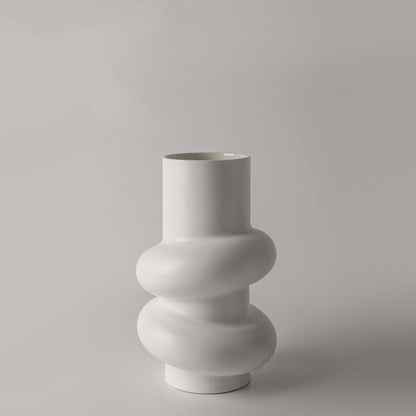 Sculptural Twist Vase, matte white ceramic with elongated neck and wrapped curved form