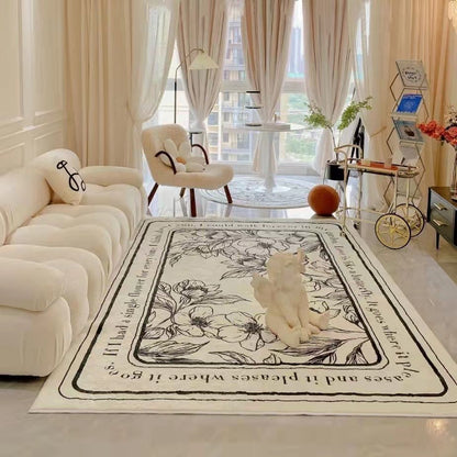 Vintage Botanical Area Rug, cream woven textile with black floral illustration and decorative border design