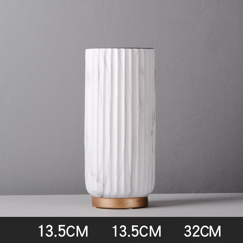 Tall Fluted Marble Vase, white marble with vertical ribbed texture and cylindrical form on wood base