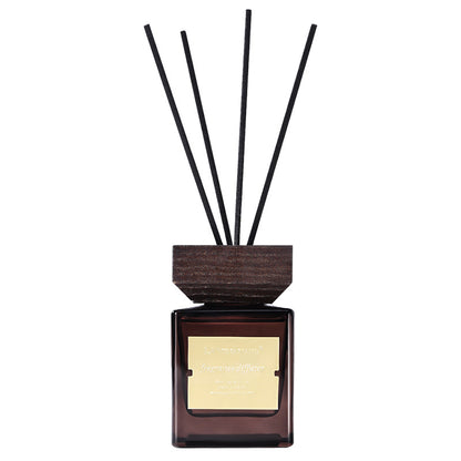 Luxury Reed Diffuser, amber glass fragrance bottle with wooden cap and black reed sticks for elegant long-lasting aromatherapy