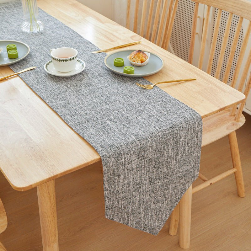 Textured Linen Table Runner, gray woven fabric with subtle crosshatch pattern and soft drape