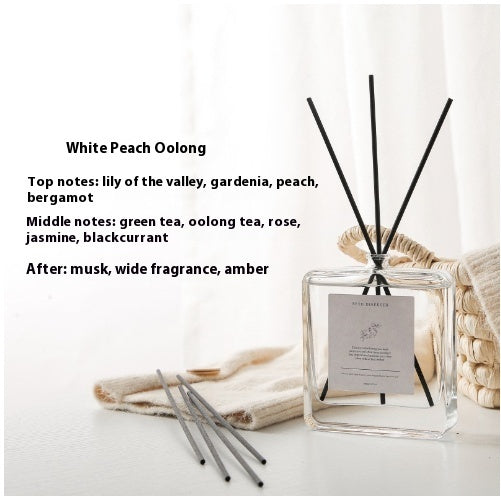 Luxury Glass Reed Diffuser, clear square bottle with black reed sticks and white peach oolong tea fragrance for a fresh, elegant and long-lasting home scent