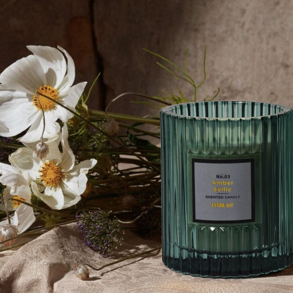 Luxury Ribbed Glass Scented Candle, green jar with amber fragrance and elegant design for a warm, relaxing home ambiance