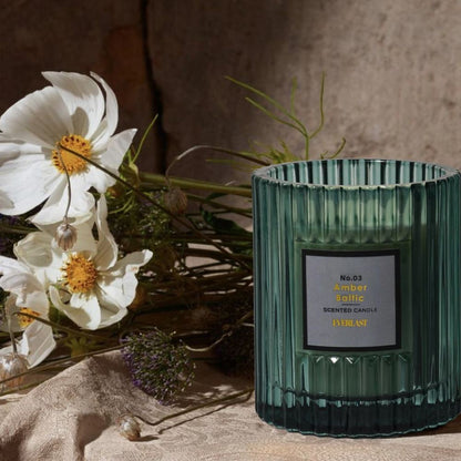 Luxury Ribbed Glass Scented Candle, green jar with amber fragrance and elegant design for a warm, relaxing home ambiance