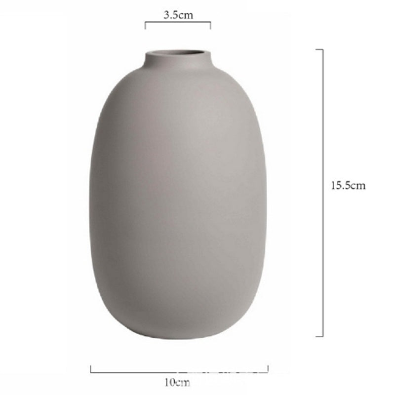 Minimal Oval Vase, matte taupe ceramic with smooth rounded body and narrow neck