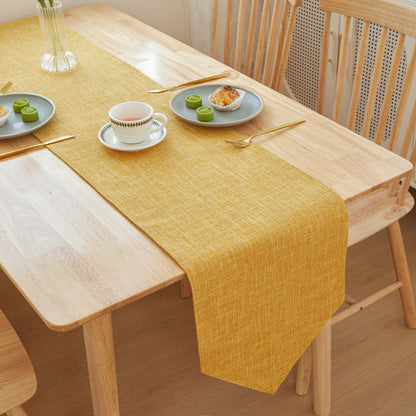 Textured Linen Table Runner, mustard yellow woven fabric with subtle crosshatch pattern and soft drape