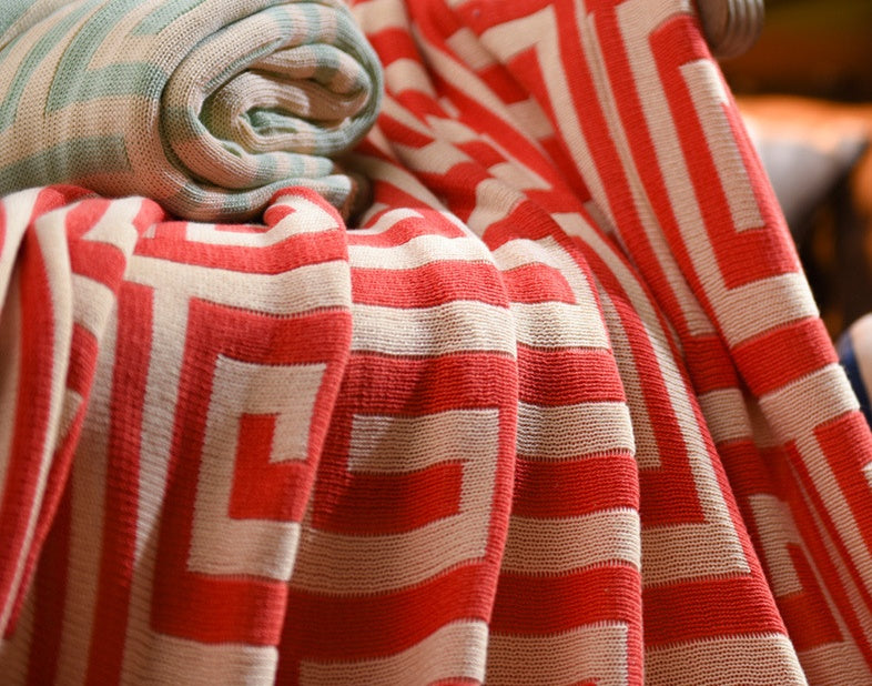 Geometric Knit Throw Blanket, red and cream Greek key pattern with soft textured weave